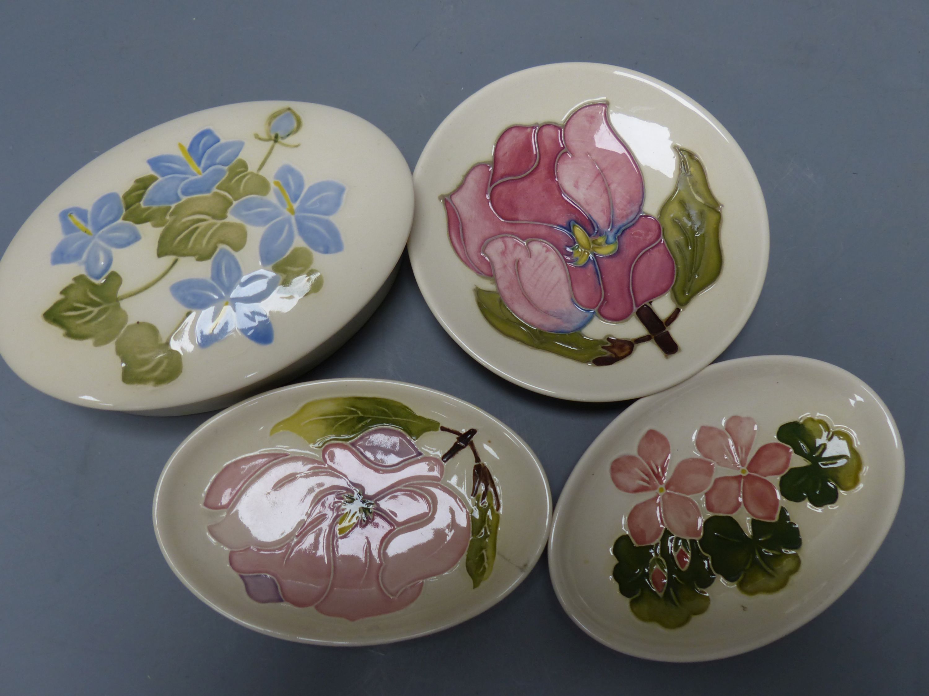 A collection of small ceramics, to include four items of Moorcroft,